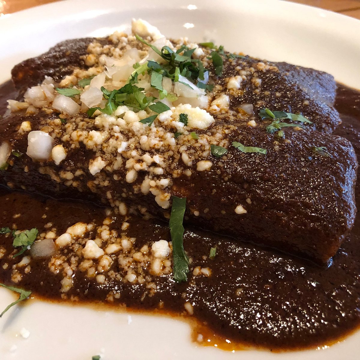 La Cocina Restaurant signature dishes TamalesEnchiladas De MoleChile Relleno Burrito